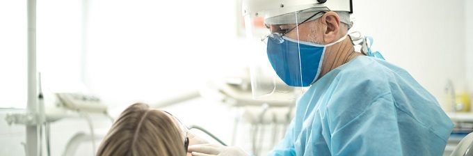 Patient being treated by a dentist