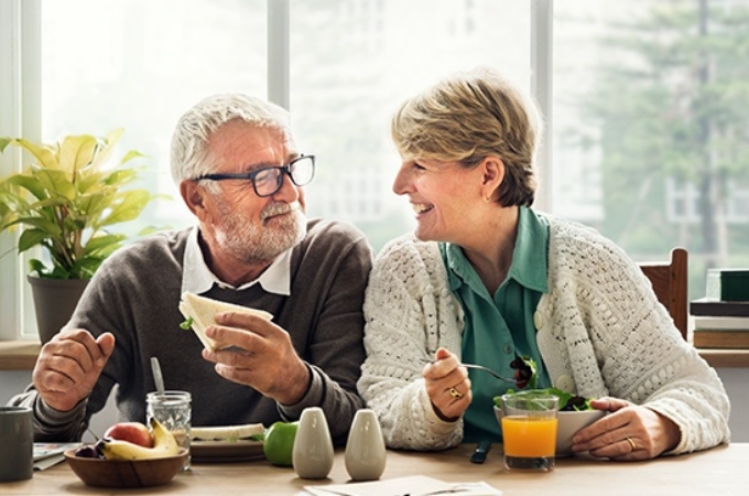 Couple eating breakfast