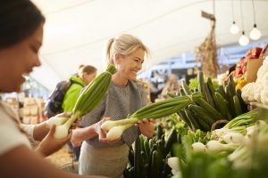 women selecting produce
