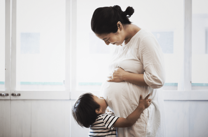 mother and son smiling