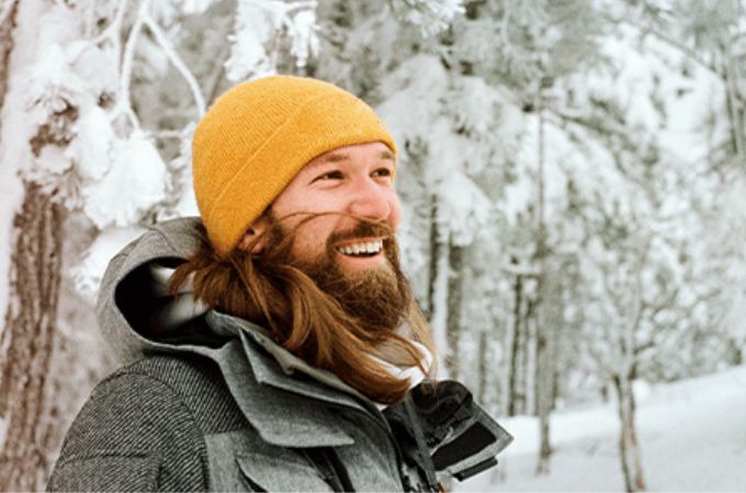 Man smiling in the snow