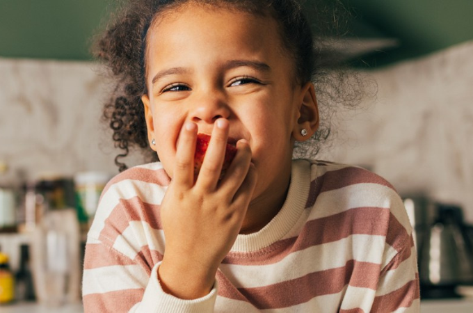 Child eating fruit