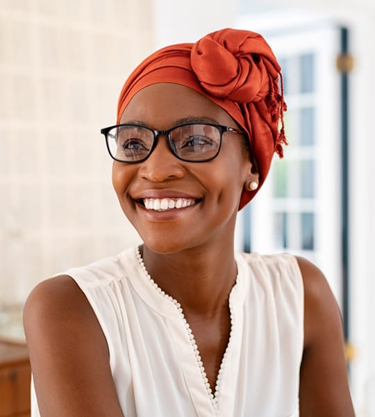 smiling woman looking offscreen