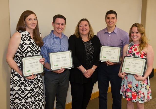 Cindy Smalley (center), board member of Delta Dental of Illinois Foundation, presented awards to SIU SDM students (L-R) Thais Meredith, Blake Ferando, Eric Safranski and Kasey Kirchner.