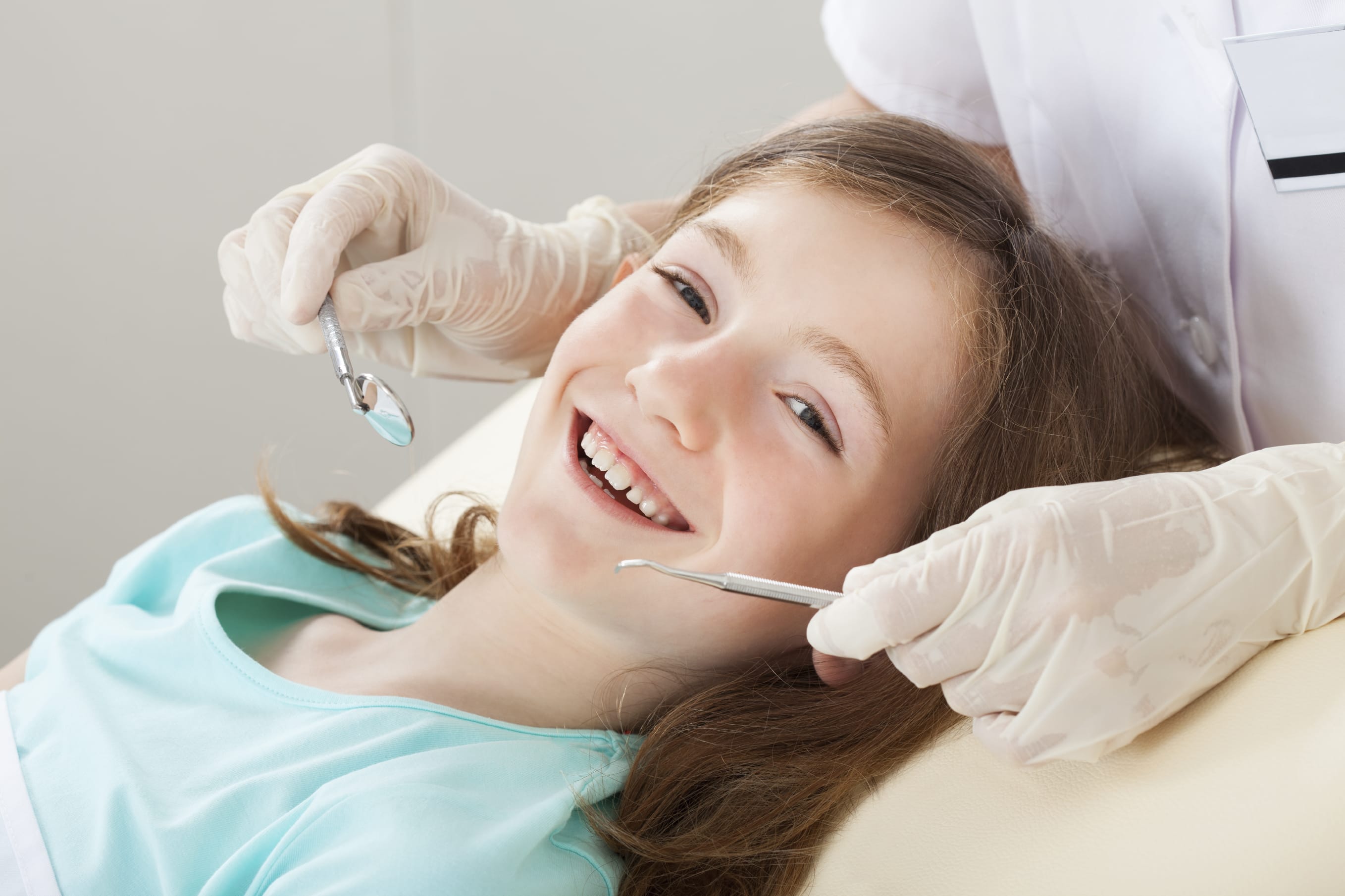 Happy Girl Undergoing Dental Treatment