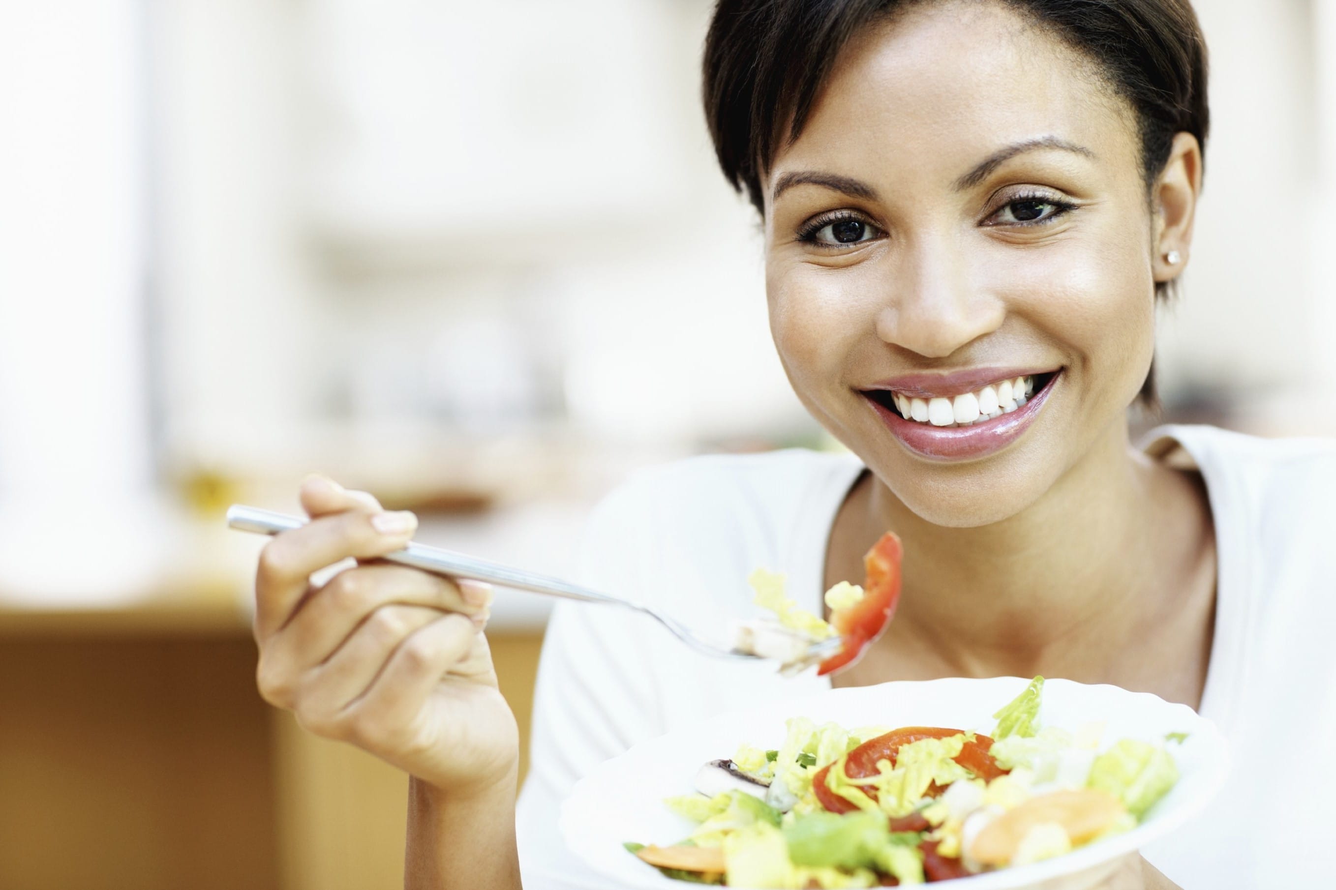 Lifestyle_Woman Eating Salad_African American