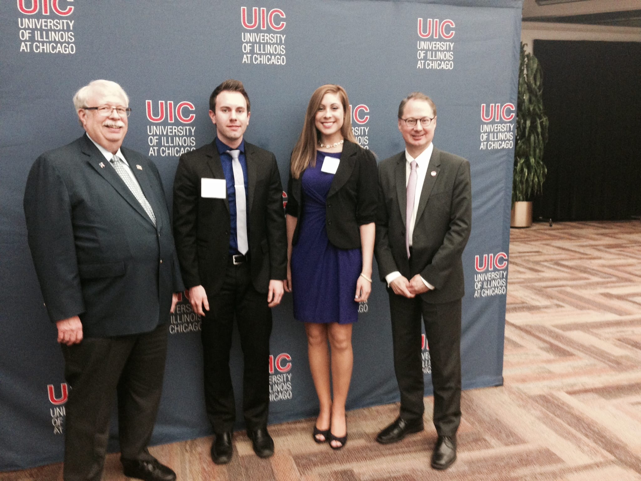 Delta Dental of Illinois Board member Craig Grannon, Christopher Greenwaldt, Jaime Chowaniec and UIC College of Dentistry Dean Dr. Clark Stanford